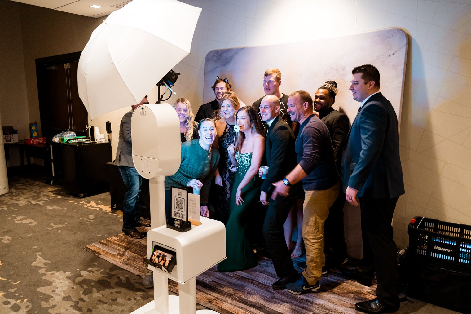 What happens when you mix a Christmas party, a throwback prom theme, and a photo booth? Absolute magic!